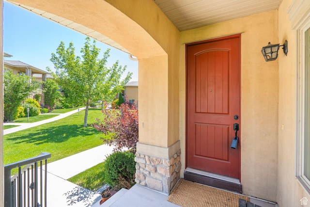 923 W 965 N, Orem, UT 84057 - doorway to property with a lawn, stone siding, and stucco siding