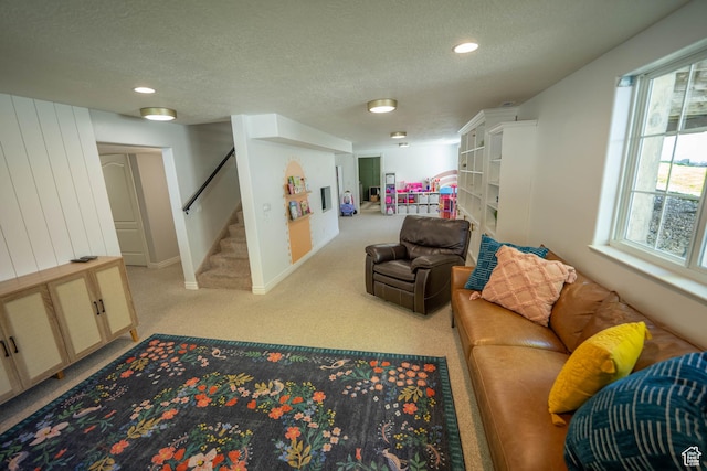 1536 E Mountain Rd, Logan, UT 84321 - living room featuring stairs, a textured ceiling, carpet floors, baseboards, and recessed lighting