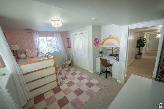 1536 E Mountain Rd, Logan, UT 84321 - bedroom featuring a desk, a closet, baseboards, and light colored carpet