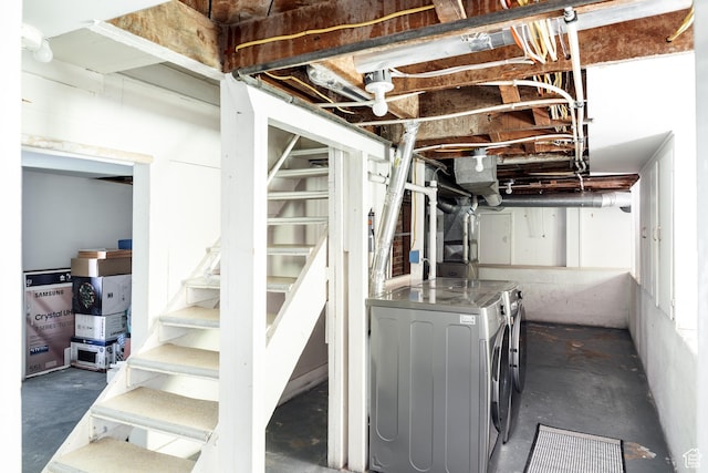 336 S Douglas St S, Salt Lake City, UT 84102 - unfinished basement featuring washing machine and dryer and stairway