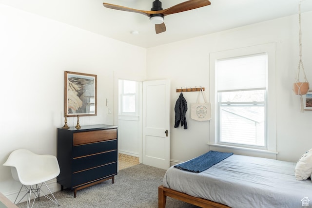 336 S Douglas St S, Salt Lake City, UT 84102 - bedroom featuring light colored carpet and ceiling fan