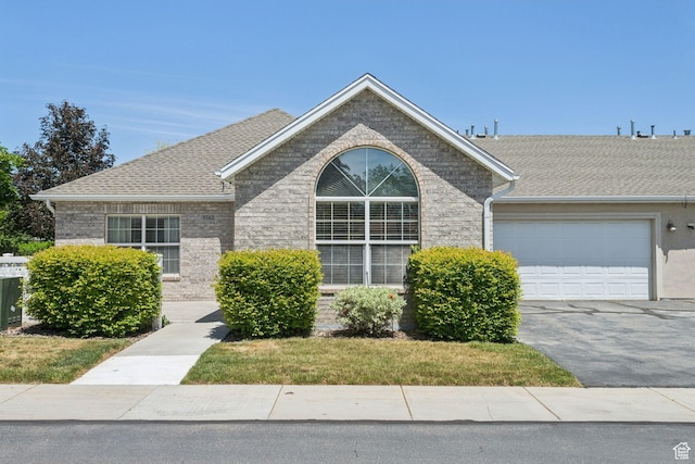 9362 S Abbey View Rd W, West Jordan, UT 84088 - ranch-style house with an attached garage, asphalt driveway, and a shingled roof