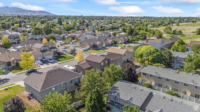 6731 S Ticklegrass Rd W, West Jordan, UT 84081 - aerial perspective of suburban area with a mountainous background