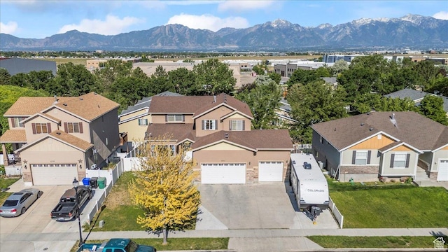 6731 S Ticklegrass Rd W, West Jordan, UT 84081 - aerial perspective of suburban area featuring a mountainous background