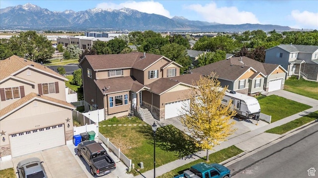 6731 S Ticklegrass Rd W, West Jordan, UT 84081 - aerial perspective of suburban area featuring mountains