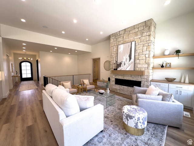 4893 W Ridge Rock Cir, Herriman, UT 84096 - living area with wood finished floors, recessed lighting, and a fireplace