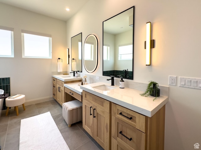 4893 W Ridge Rock Cir, Herriman, UT 84096 - bathroom featuring vanity, tile patterned flooring, and baseboards