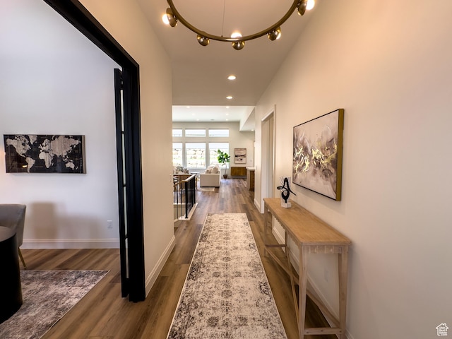 4893 W Ridge Rock Cir, Herriman, UT 84096 - corridor featuring wood finished floors, recessed lighting, a chandelier, and baseboards