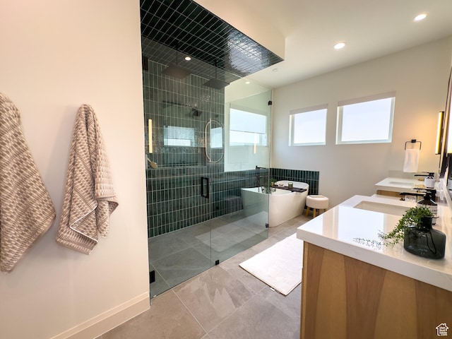 4893 W Ridge Rock Cir, Herriman, UT 84096 - full bathroom with a shower stall, a freestanding bath, double vanity, recessed lighting, and tile patterned flooring