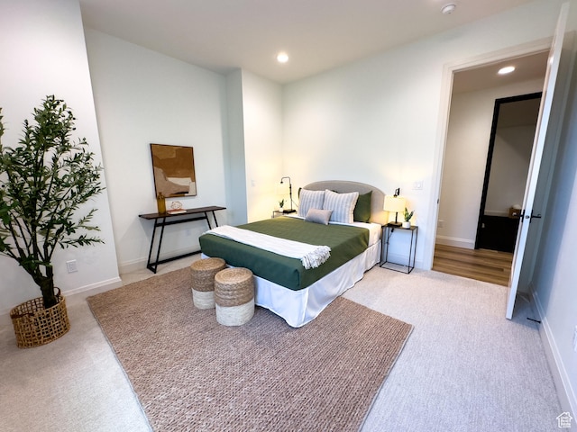 4893 W Ridge Rock Cir, Herriman, UT 84096 - bedroom with light carpet, recessed lighting, and baseboards