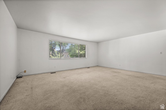 2220 E Murray Holladay Rd Unit 184, Holladay, UT 84117 - carpeted spare room featuring baseboards