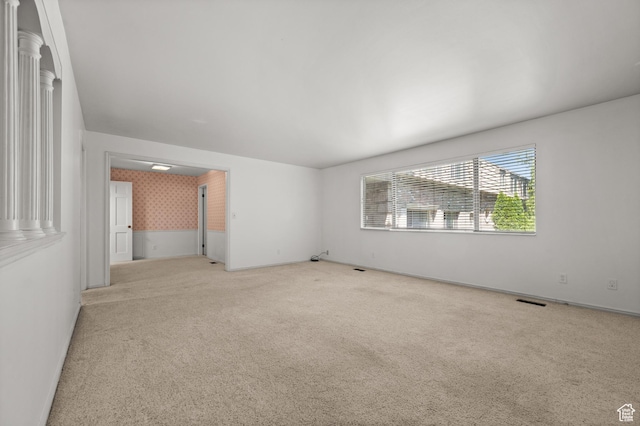 2220 E Murray Holladay Rd Unit 184, Holladay, UT 84117 - spare room with wallpapered walls, carpet, and baseboards