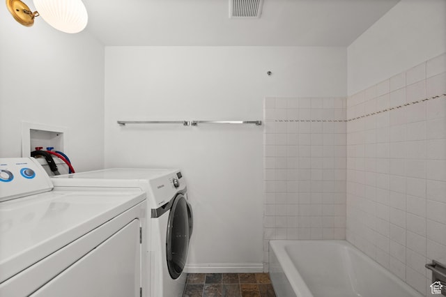 2220 E Murray Holladay Rd Unit 184, Holladay, UT 84117 - laundry room with washer and dryer and baseboards