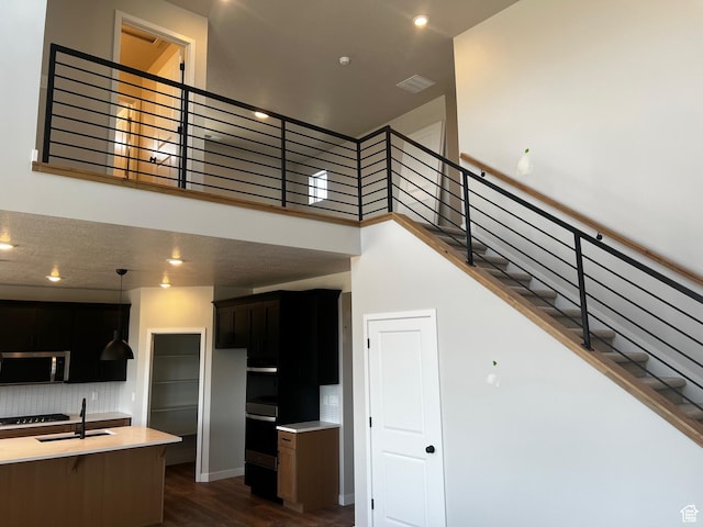 597 W Domanick Way Unit 4, Saratoga Springs, UT 84045 - stairway with wood finished floors and baseboards