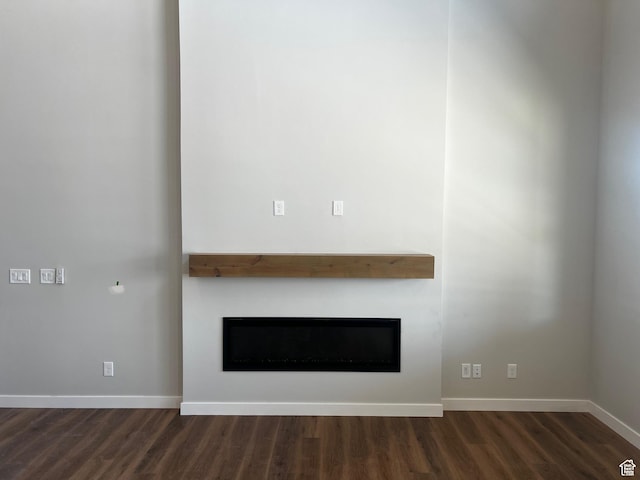 597 W Domanick Way Unit 4, Saratoga Springs, UT 84045 - unfurnished living room featuring a fireplace, wood finished floors, and baseboards