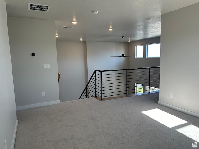 597 W Domanick Way Unit 4, Saratoga Springs, UT 84045 - unfurnished room featuring carpet floors, baseboards, and a smoke detector