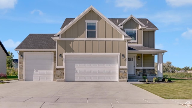 101 E 1500 N, North Ogden, UT 84404 - craftsman inspired home featuring stone siding, board and batten siding, concrete driveway, roof with shingles, and a front yard