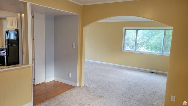 902 W 500 N, Provo, UT 84601 - carpeted empty room with arched walkways, baseboards, and crown molding
