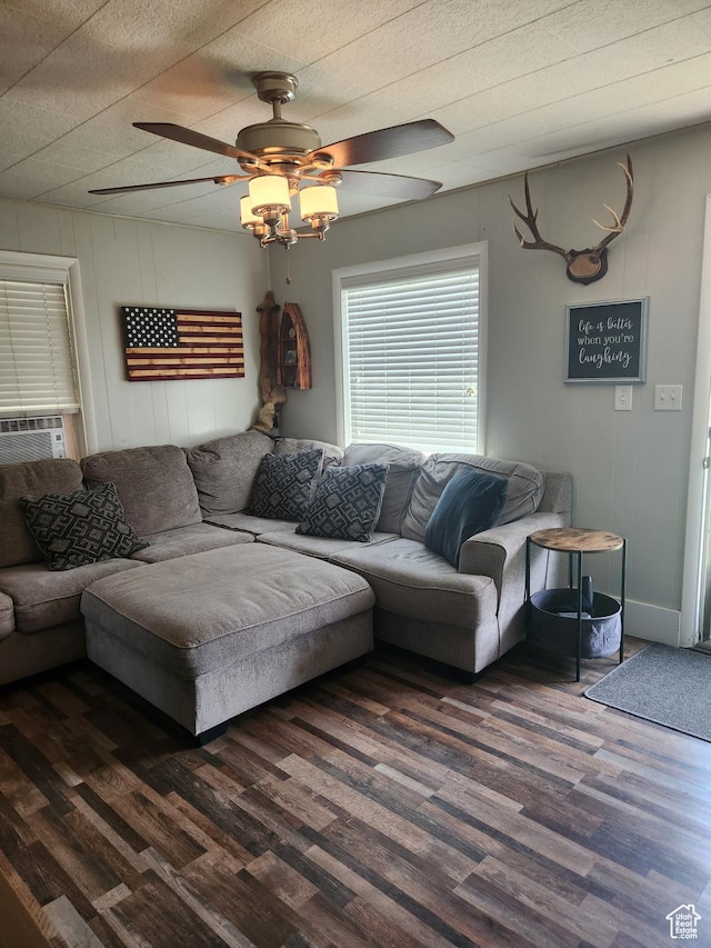 139 E 100 N, Franklin, ID 83237 - living room featuring dark wood-style flooring, a ceiling fan, and cooling unit