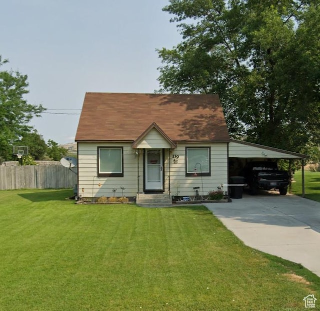 139 E 100 N, Franklin, ID 83237 - bungalow-style home with an attached carport and concrete driveway