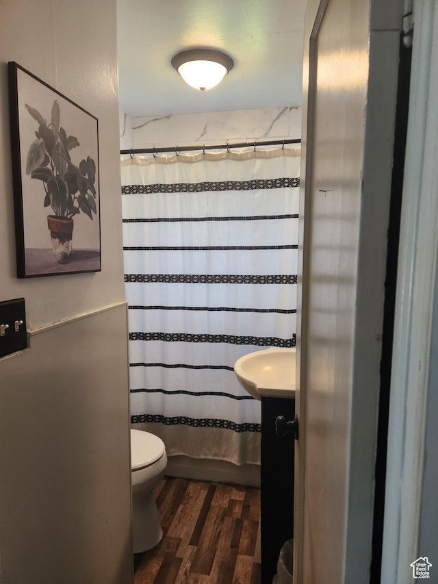 139 E 100 N, Franklin, ID 83237 - full bathroom featuring wood finished floors and toilet