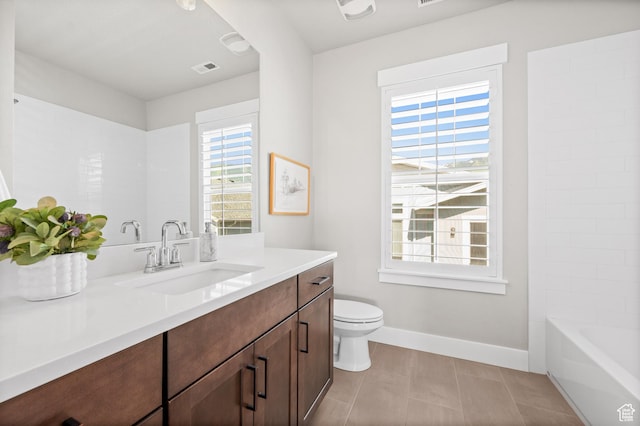 10685 S Dielsdorf Rd E, Sandy, UT 84092 - full bathroom featuring vanity, plenty of natural light, toilet, and baseboards