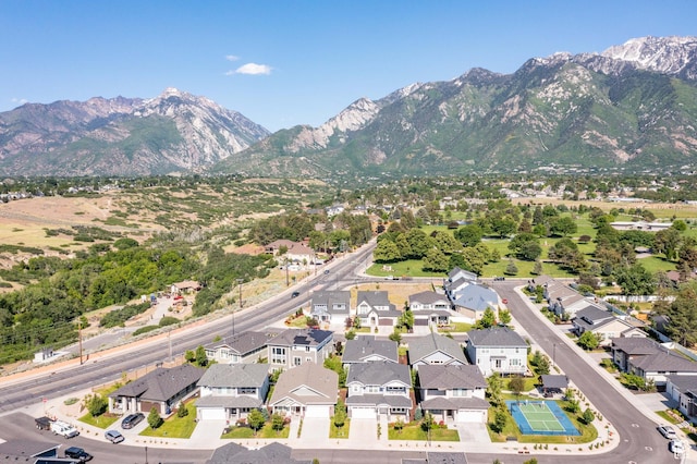 10685 S Dielsdorf Rd E, Sandy, UT 84092 - aerial overview of property's location with a mountain backdrop and nearby suburban area