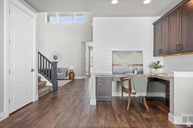 10685 S Dielsdorf Rd E, Sandy, UT 84092 - office area with built in desk, dark wood finished floors, recessed lighting, and baseboards