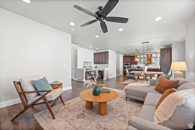 10685 S Dielsdorf Rd E, Sandy, UT 84092 - living room with recessed lighting, baseboards, dark wood-style floors, and ceiling fan