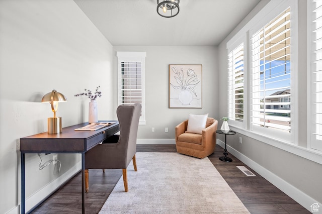 10685 S Dielsdorf Rd E, Sandy, UT 84092 - home office featuring dark wood finished floors and baseboards
