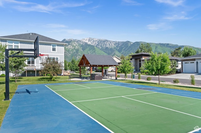 10685 S Dielsdorf Rd E, Sandy, UT 84092 - view of tennis court featuring a gazebo, a mountain view, a lawn, and community basketball court