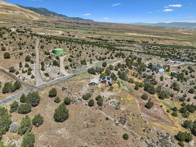 8043 W Hi Country Rd S, Herriman, UT 84096 - aerial overview of property's location with rural landscape and a mountainous background