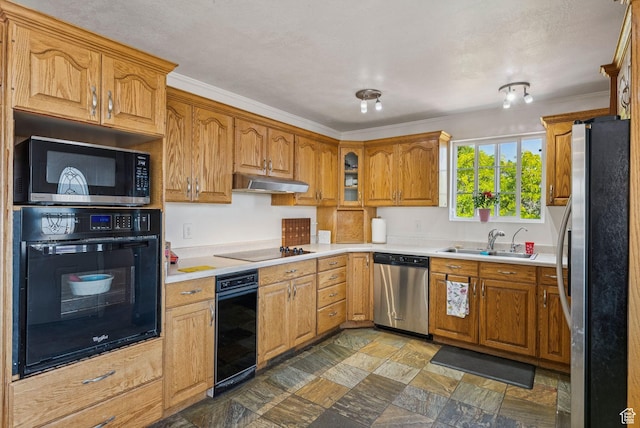 8043 W Hi Country Rd S, Herriman, UT 84096 - kitchen with black appliances, a sink, under cabinet range hood, brown cabinets, and stone finish floors