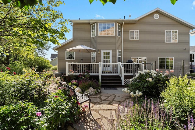 963 E 1275 N, Ogden, UT 84404 - rear view of property with a deck and a patio area