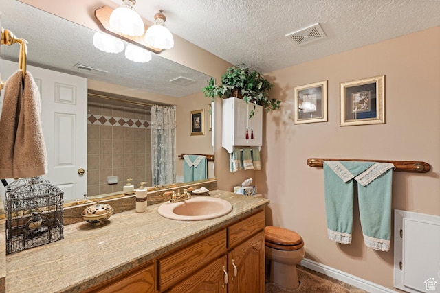963 E 1275 N, Ogden, UT 84404 - full bathroom with toilet, vanity, a shower with shower curtain, and a textured ceiling