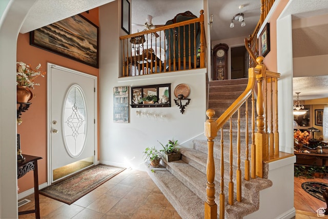 963 E 1275 N, Ogden, UT 84404 - tiled entryway featuring stairway and arched walkways