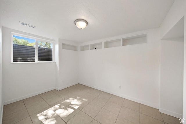 5111 S 1000 E, Murray, UT 84117 - unfurnished room featuring baseboards and tile patterned flooring