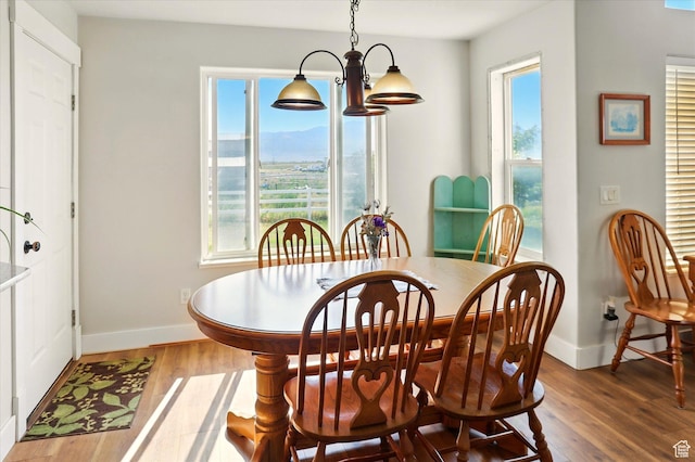 913 N 2300 W, Tremonton, UT 84337 - dining room featuring wood finished floors and baseboards
