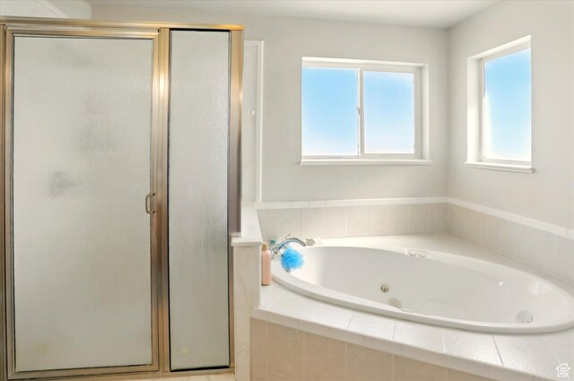 913 N 2300 W, Tremonton, UT 84337 - bathroom featuring a stall shower and a tub with jets