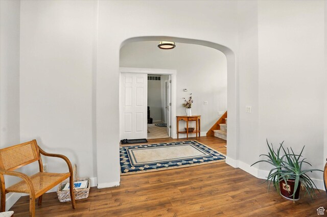 913 N 2300 W, Tremonton, UT 84337 - corridor with arched walkways, wood finished floors, and stairway