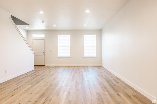 520 S Orchard Dr Unit 17, Bountiful, UT 84010 - unfurnished living room featuring light wood-style floors, recessed lighting, and baseboards