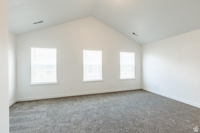 520 S Orchard Dr Unit 17, Bountiful, UT 84010 - empty room with vaulted ceiling, carpet floors, and baseboards