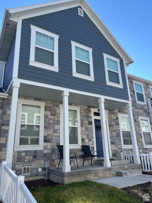 520 S Orchard Dr Unit 17, Bountiful, UT 84010 - view of property featuring a porch and stone siding