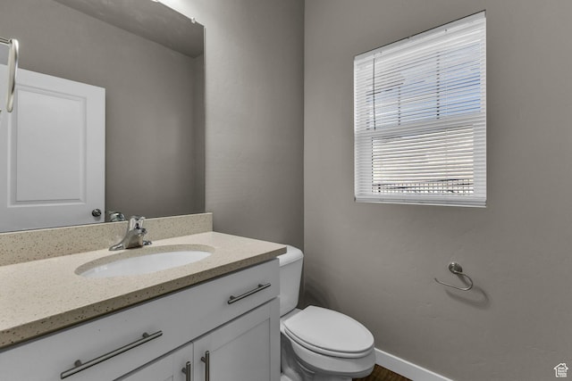 4957 N Marble Fox Way E Unit 118, Lehi, UT 84043 - half bathroom with toilet, vanity, and baseboards