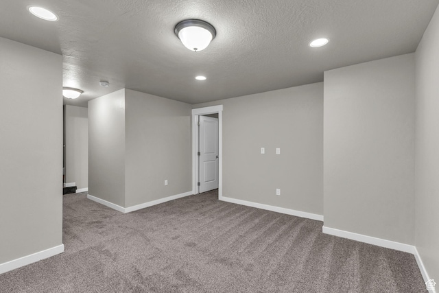 4957 N Marble Fox Way E Unit 118, Lehi, UT 84043 - unfurnished room with carpet, baseboards, a textured ceiling, and recessed lighting
