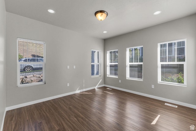 4957 N Marble Fox Way E Unit 118, Lehi, UT 84043 - unfurnished room featuring dark wood-style flooring, baseboards, and recessed lighting