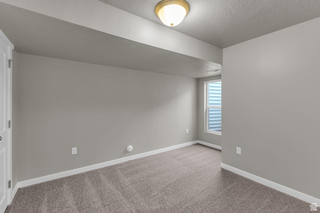 4957 N Marble Fox Way E Unit 118, Lehi, UT 84043 - empty room with carpet flooring, baseboards, and a textured ceiling