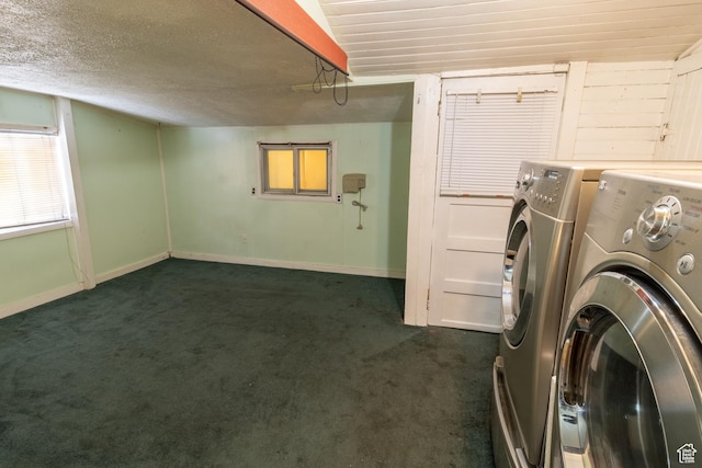 3219 Pingree Ave, Ogden, UT 84401 - washroom featuring washing machine and clothes dryer, dark carpet, baseboards, and a textured ceiling
