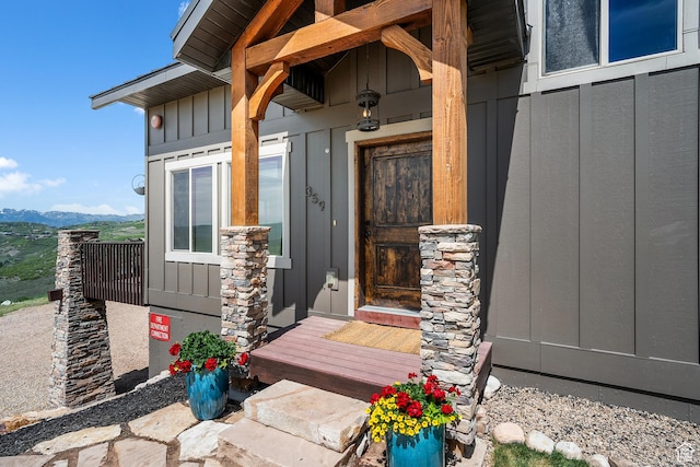 359 Parkview Rd, Coalville, UT 84017 - doorway to property featuring board and batten siding and a mountain view