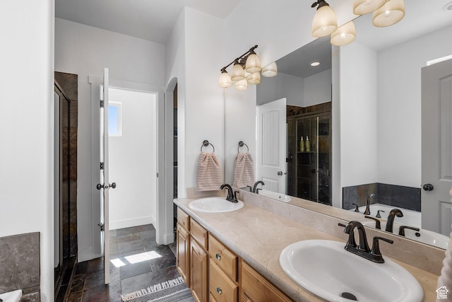 359 Parkview Rd, Coalville, UT 84017 - bathroom featuring a shower stall, double vanity, a bath, stone tile flooring, and baseboards